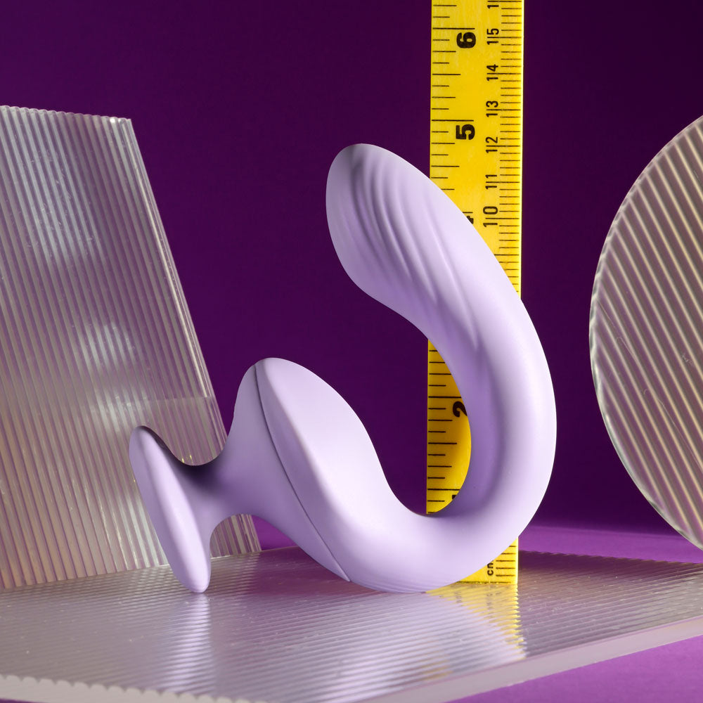 Playboy Pleasure REV ME UP - USB Rechargeable Dual Motor Curved Vibrator next to a ruler for size reference.