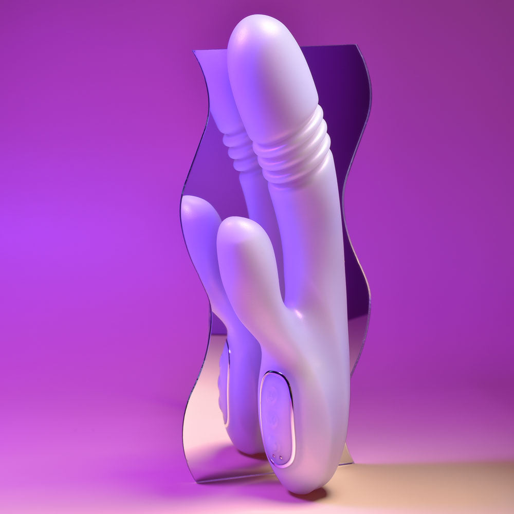 Playboy Pleasure BUMPING BUNNY - Opal 22.9 cm USB Rechargeable Thrusting & Warming Rabbit Vibrator on display.