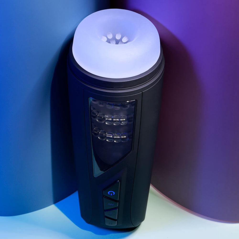 Playboy Pleasure PURSUIT OF PLEASURE - USB Rechargeable Vibrating Stroker on a colorful background.