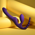 Playboy Pleasure HUG IT OUT - 29 cm USB Rechargeable Strapless Strap-On on yellow background, showcasing sensual design.