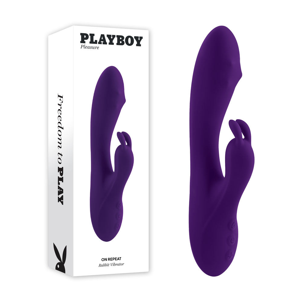Playboy Pleasure ON REPEAT - 19.7 cm USB Rechargeable Rabbit Vibrator with packaging beside it.