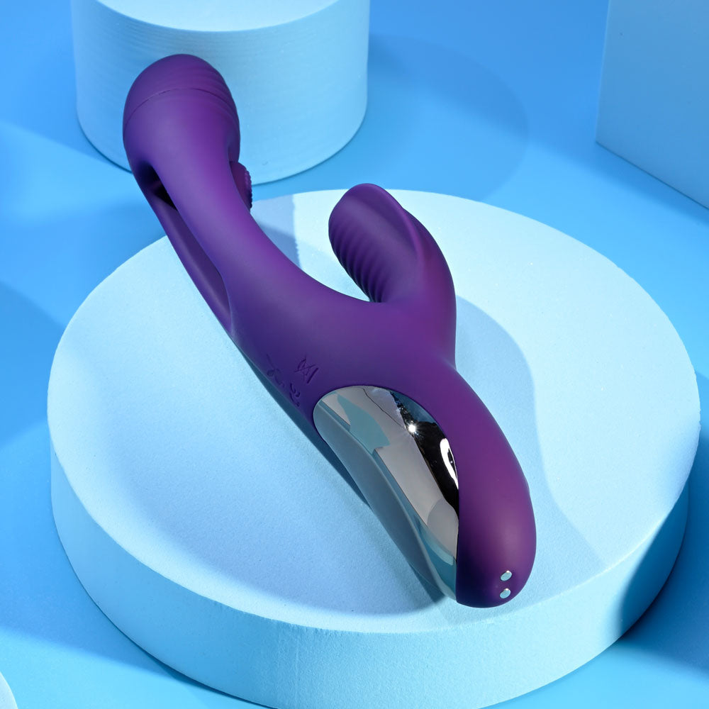 USB rechargeable rabbit vibrator in purple with unique design on a blue display.