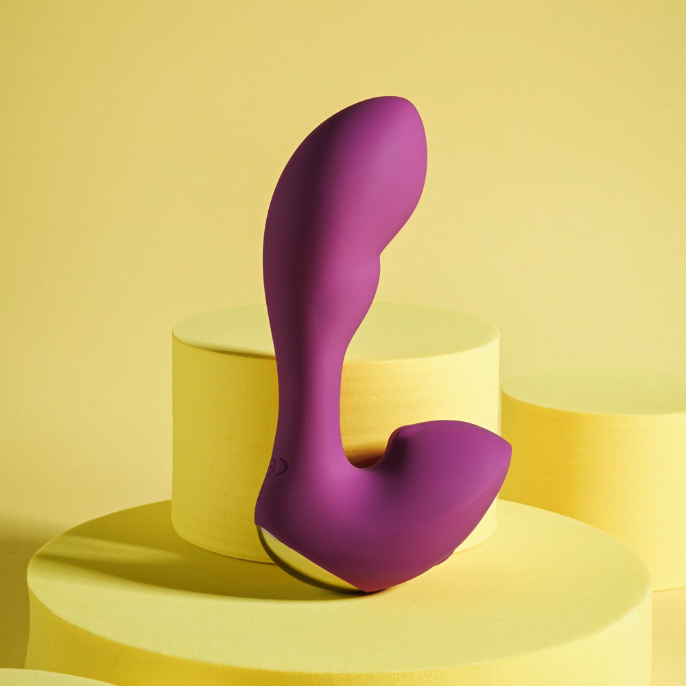 Playboy Pleasure ARCH -  14.1 cm USB Rechargeable G-Spot Vibrator on yellow display platform.