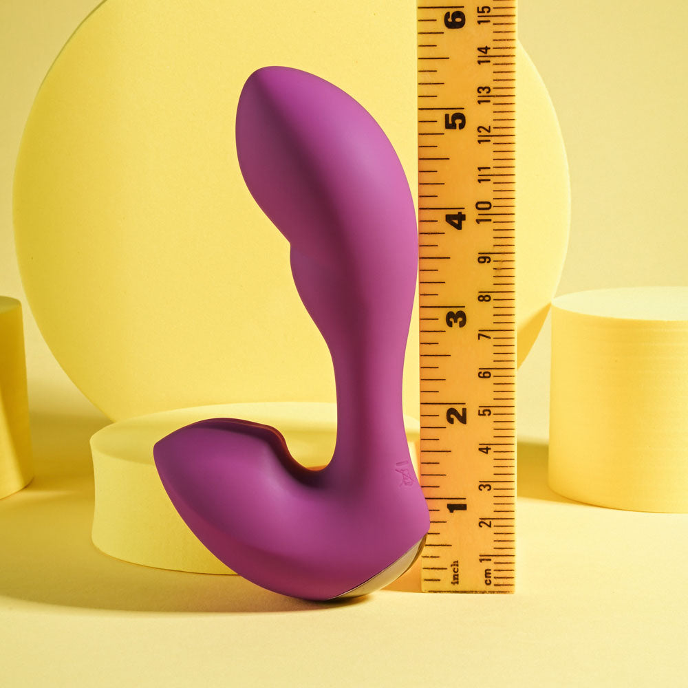 Playboy Pleasure ARCH -  14.1 cm USB Rechargeable G-Spot Vibrator next to a ruler for size reference