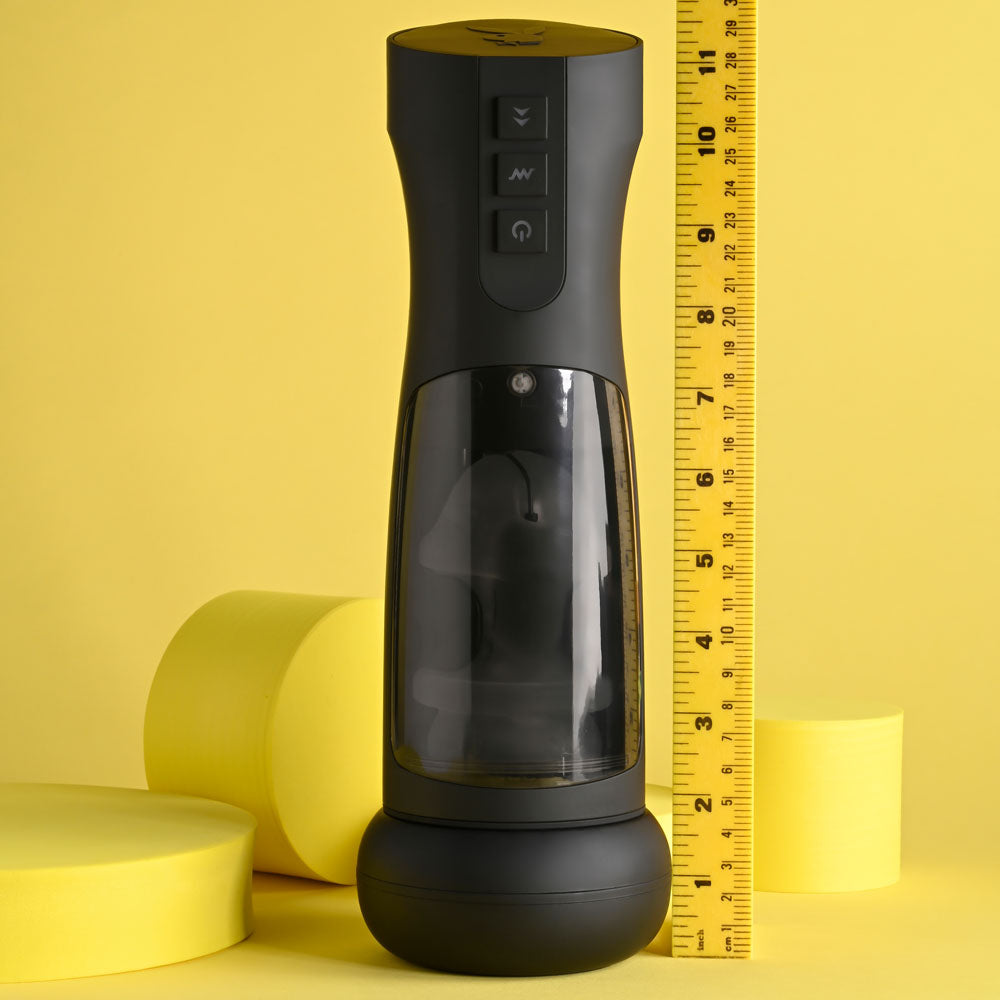 Playboy Pleasure END GAME - USB Rechargeable Vibrating & Self Sanitising Stroker next to a ruler on a yellow background.