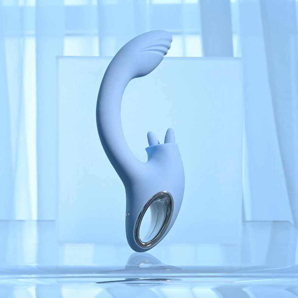 Playboy Pleasure SAPPHIRE SKY - 21.6 cm USB Rechargeable Vibrator with Double Tongue Stimulator on a stylish background.