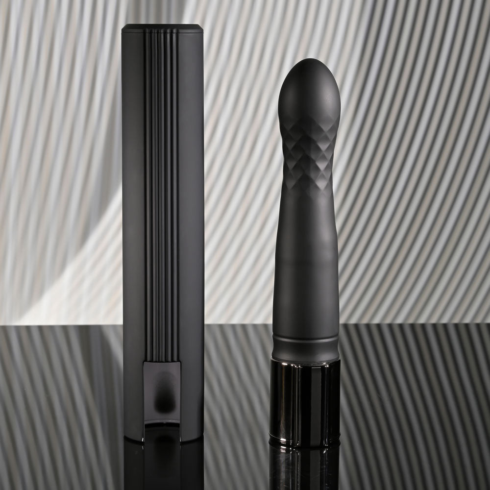 Playboy Pleasure PLEASURE ZONE - 21.4 cm Rechargeable Vibrator with USB Charging Dock on a sleek black surface.