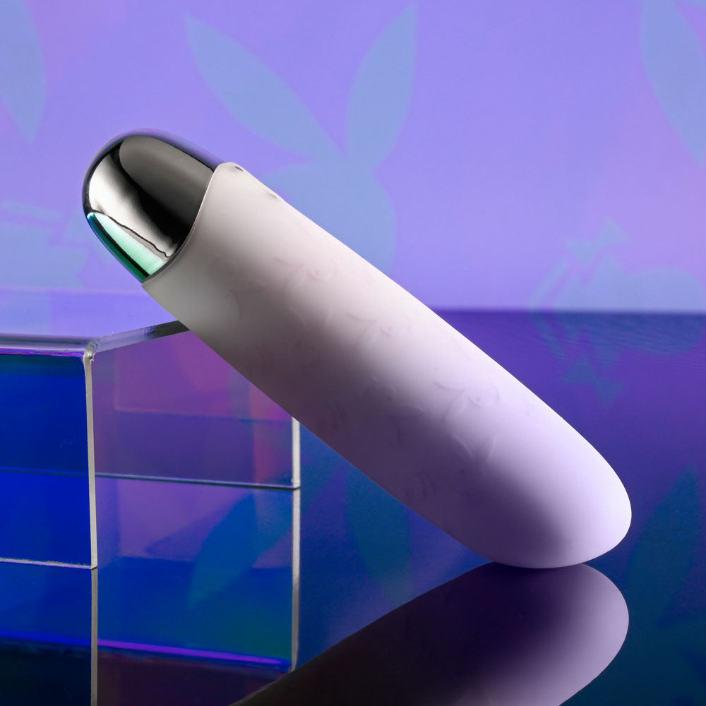 Playboy Pleasure BUNNY BUNCH - Pearl 11.3 cm USB Rechargeable Bullet on display with a stylish design.