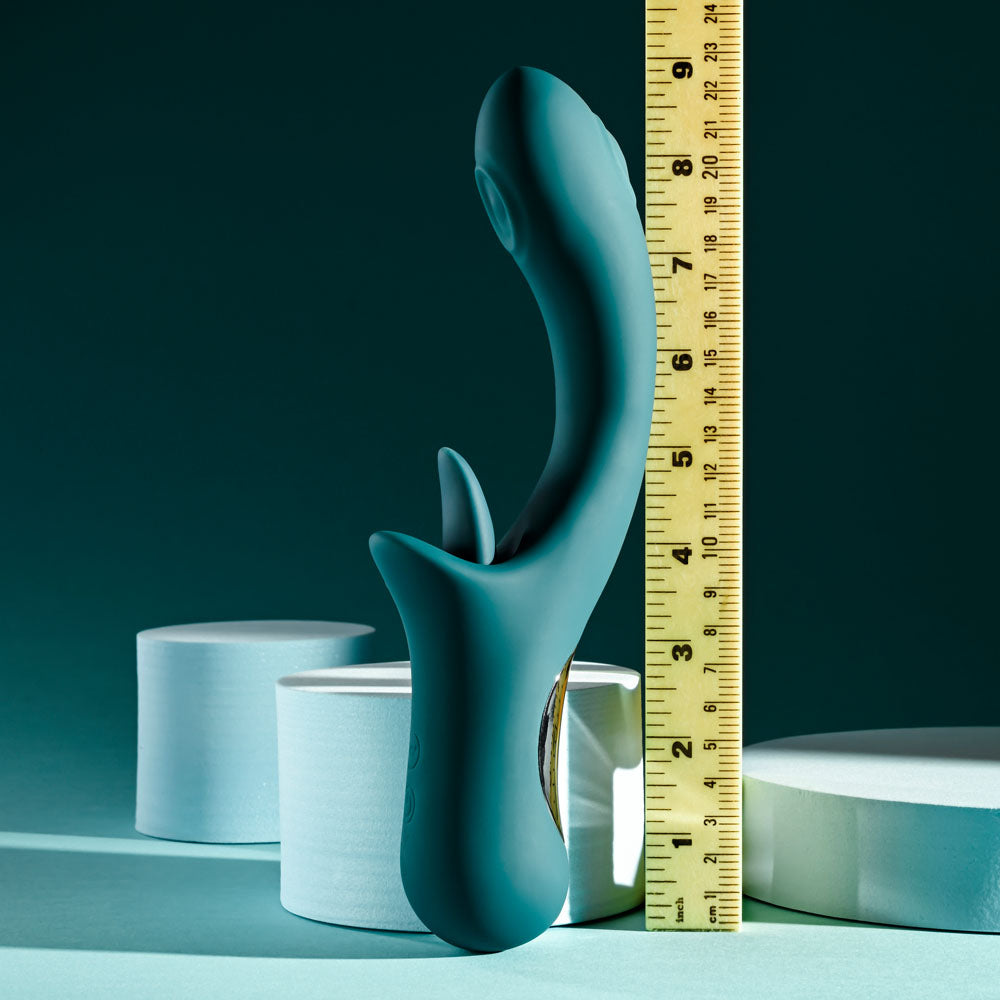 Playboy Pleasure HARMONY - 22.9 cm USB Rechargeable Vibrator with Clitoral Flicker displayed next to a ruler for size reference.