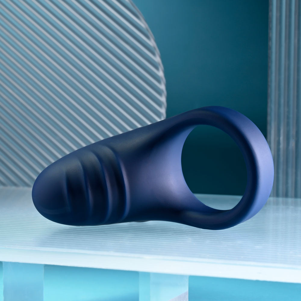 Playboy Pleasure Point USB rechargeable vibrating cock ring in blue silicone, designed for enhanced pleasure.