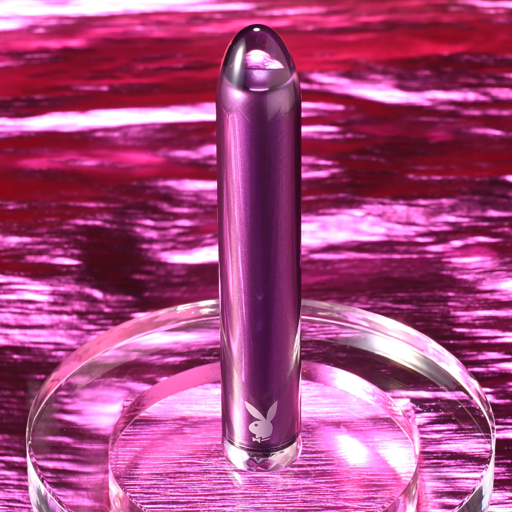 Playboy Pleasure AMETHYST -  12.4 cm USB Rechargeable Glass Tipped Mini Vibrator on display.