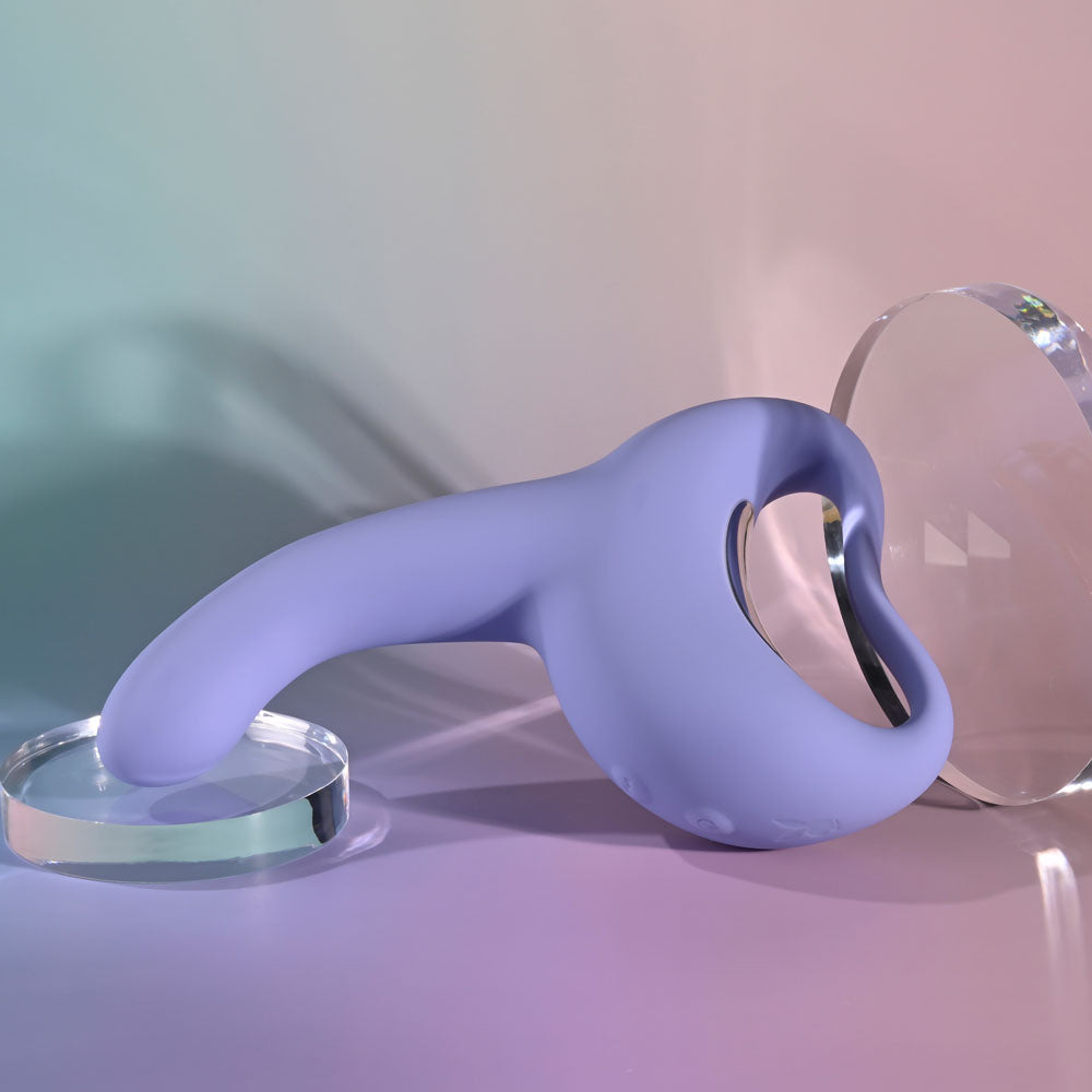 Playboy Pleasure NICE TO MEET YOU - 19.5 cm USB Rechargeable Vibrator on display with elegant light backdrop.