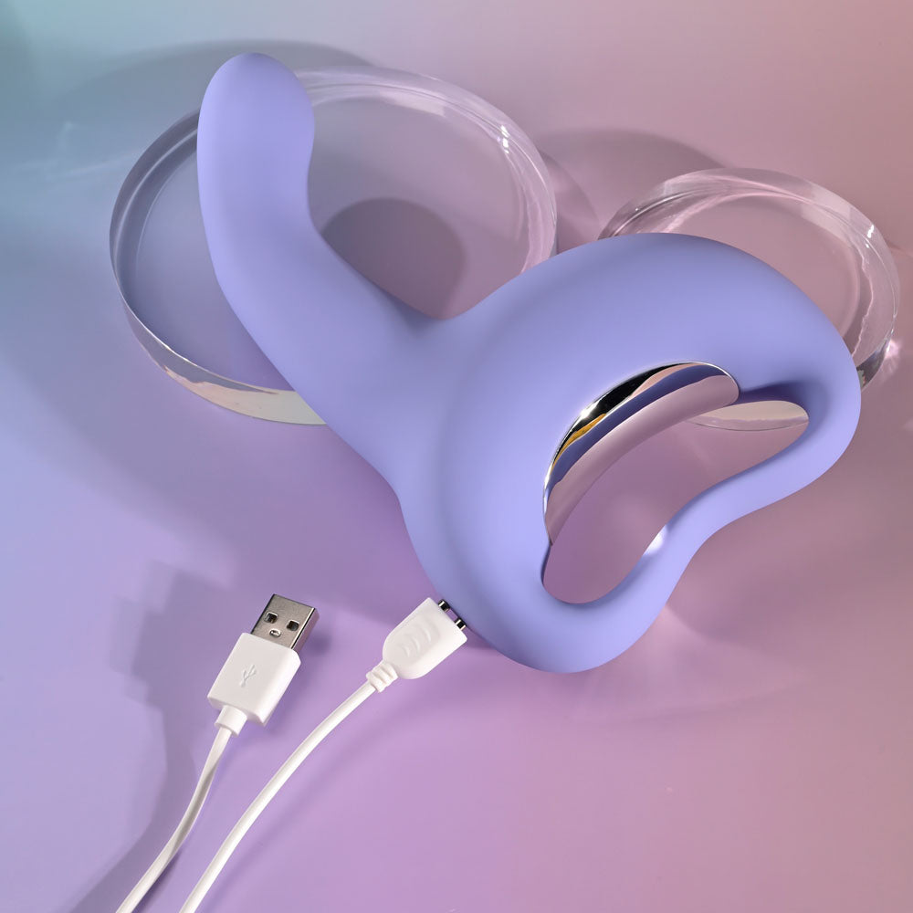 Playboy Pleasure NICE TO MEET YOU - 19.5 cm USB Rechargeable Vibrator in soft purple with USB charging cable.