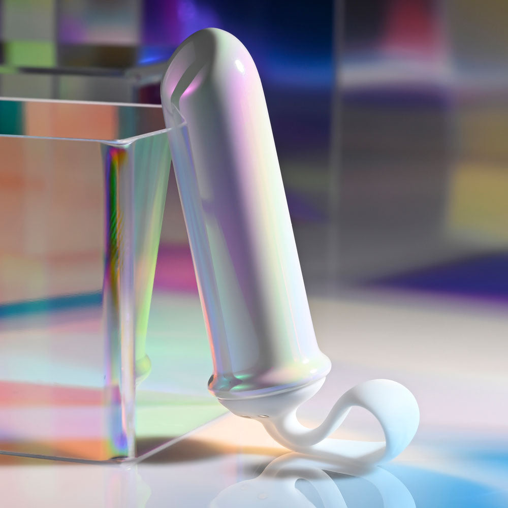 Playboy Pleasure ORGASMIC FANTASY - USB Rechargeable 13.5 cm Bullet on a reflective surface with iridescent shine.