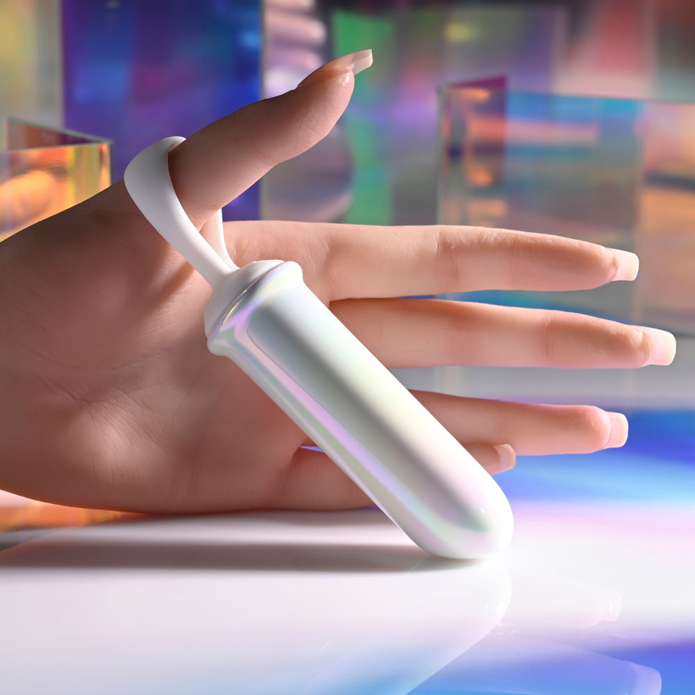 Playboy Pleasure ORGASMIC FANTASY - USB Rechargeable 13.5 cm Bullet held in hand, showcasing its iridescent design.