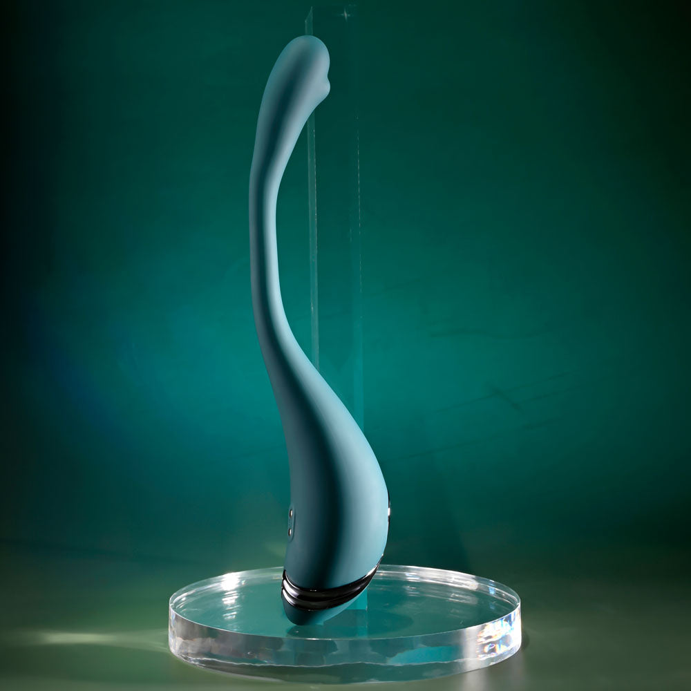 Playboy Pleasure PINPOINT PERFECTION - 19.3 cm USB Rechargeable Poseable Vibrator on display against a teal background.