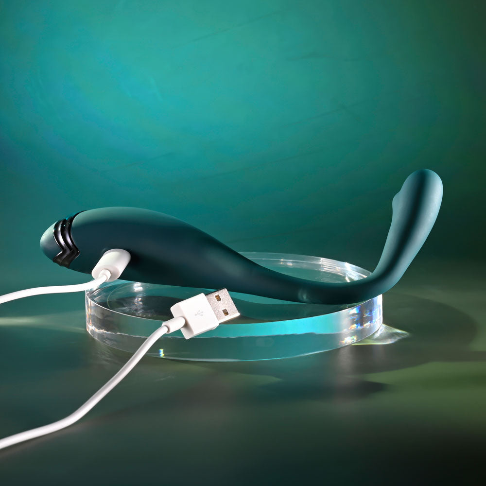 Playboy Pleasure PINPOINT PERFECTION - 19.3 cm USB Rechargeable Poseable Vibrator on a charging base.