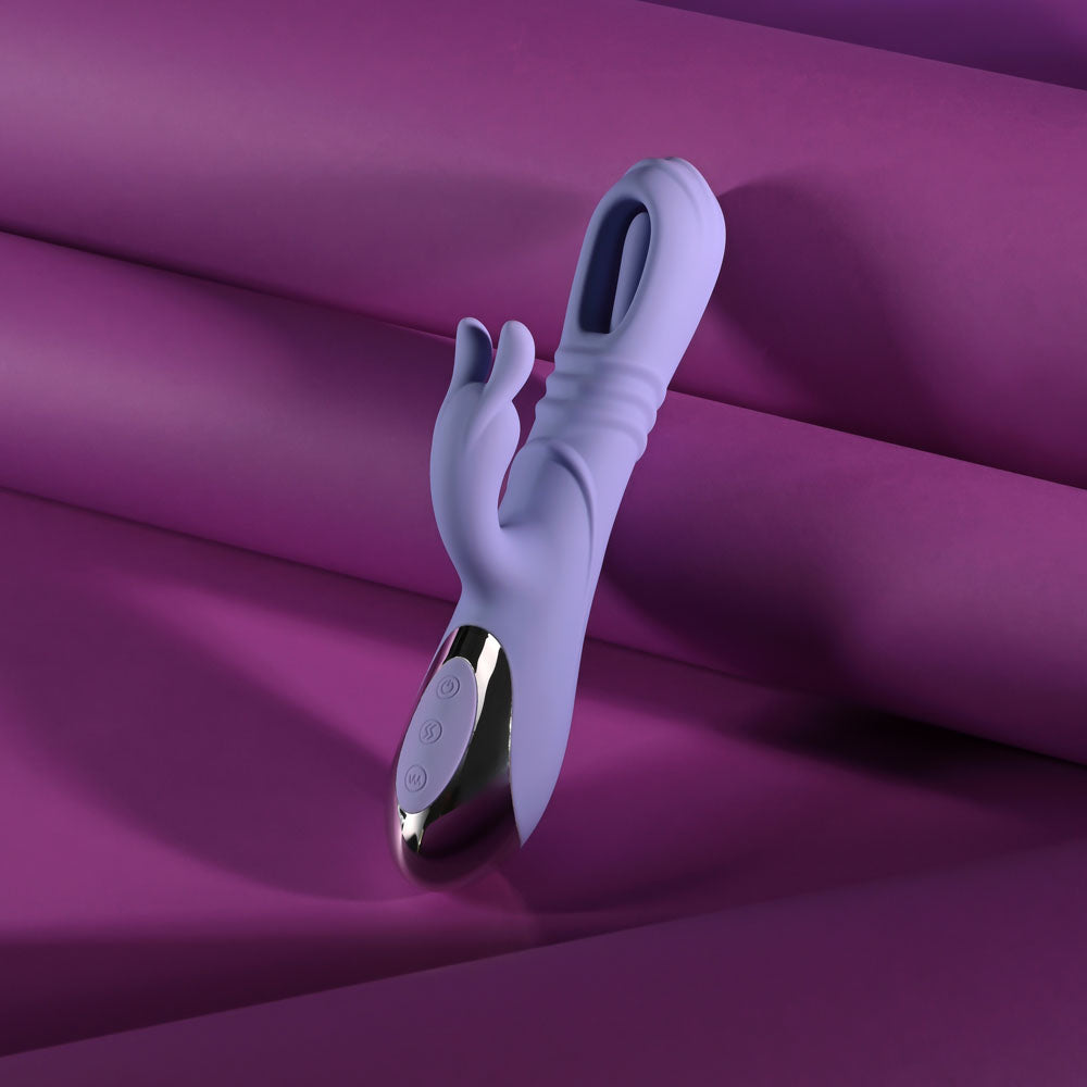 Playboy Pleasure TAP ME IN - USB rechargeable rabbit vibrator on purple background for G-spot stimulation.