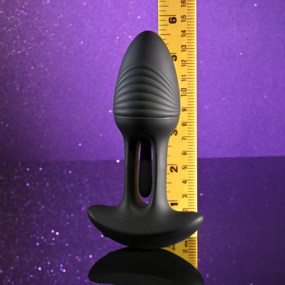 Playboy Pleasure RIM SHOT -  11.4 cm USB Rechargeable Vibrating Butt Plug on a glittery background.