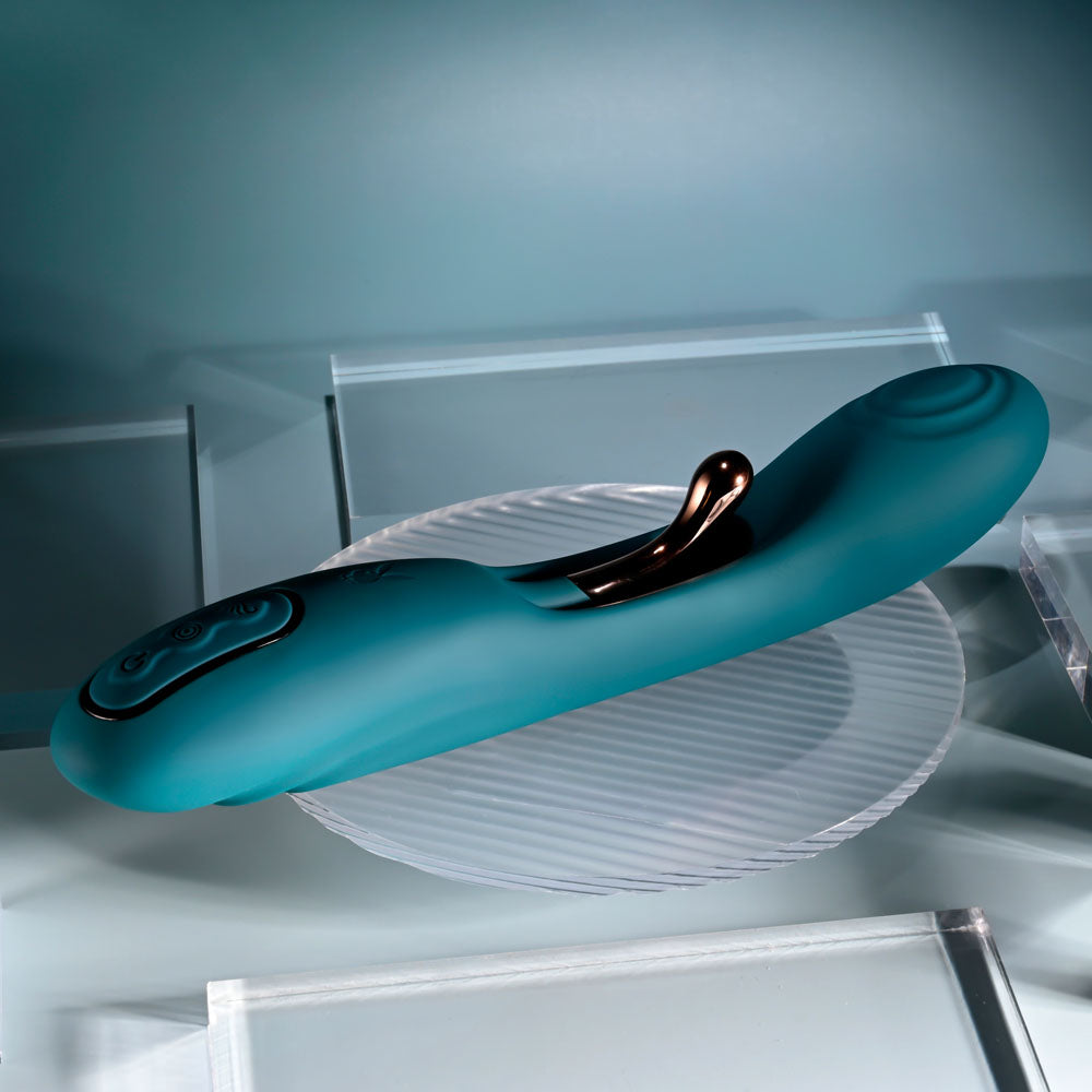 Playboy Pleasure AURELIE - 22.7 cm USB Rechargeable Vibrator with Internal Flicker on a clear surface