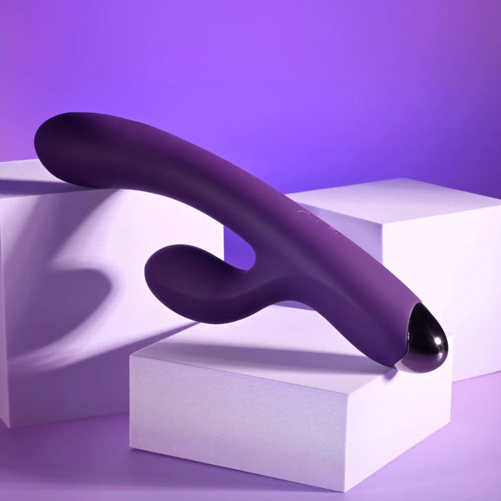 Playboy Pleasure NEW CRUSH -  20.6 cm USB Rechargeable Rabbit Vibrator on display with a sleek purple design.
