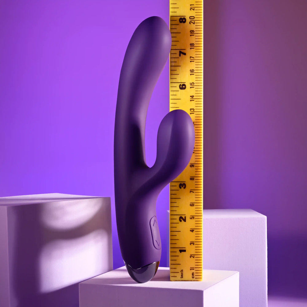 Playboy Pleasure NEW CRUSH - 20.6 cm USB Rechargeable Rabbit Vibrator displayed next to a measurement tape for size reference.