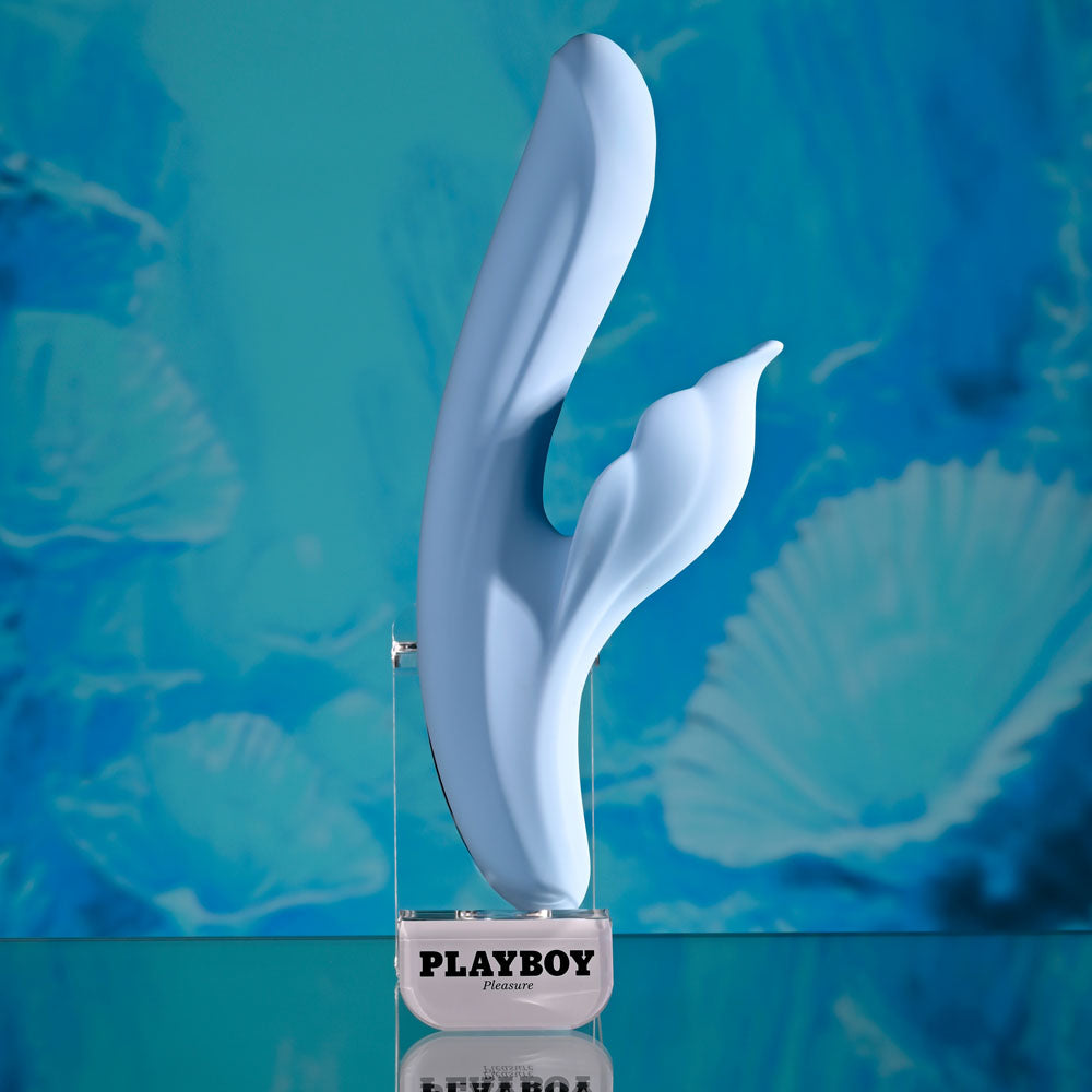 Playboy Pleasure IN BLOOM - 23.5 cm USB Rechargeable Thrusting Tapping & Heating Dual Vibrator displayed on a vibrant background.