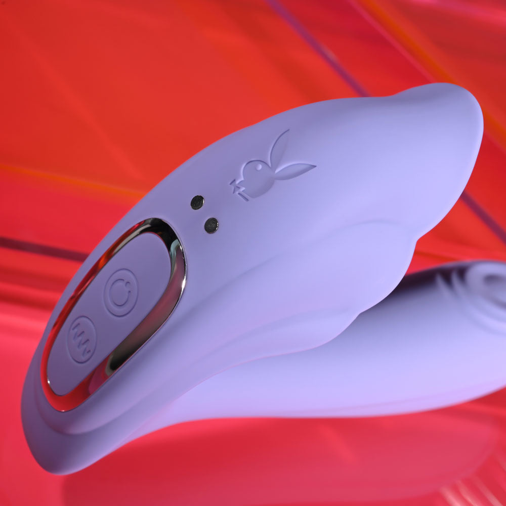 Playboy Pleasure LILAC FANTASY -  13.5 cm USB Rechargeable Tapping Vibrator with Remote in lilac color.