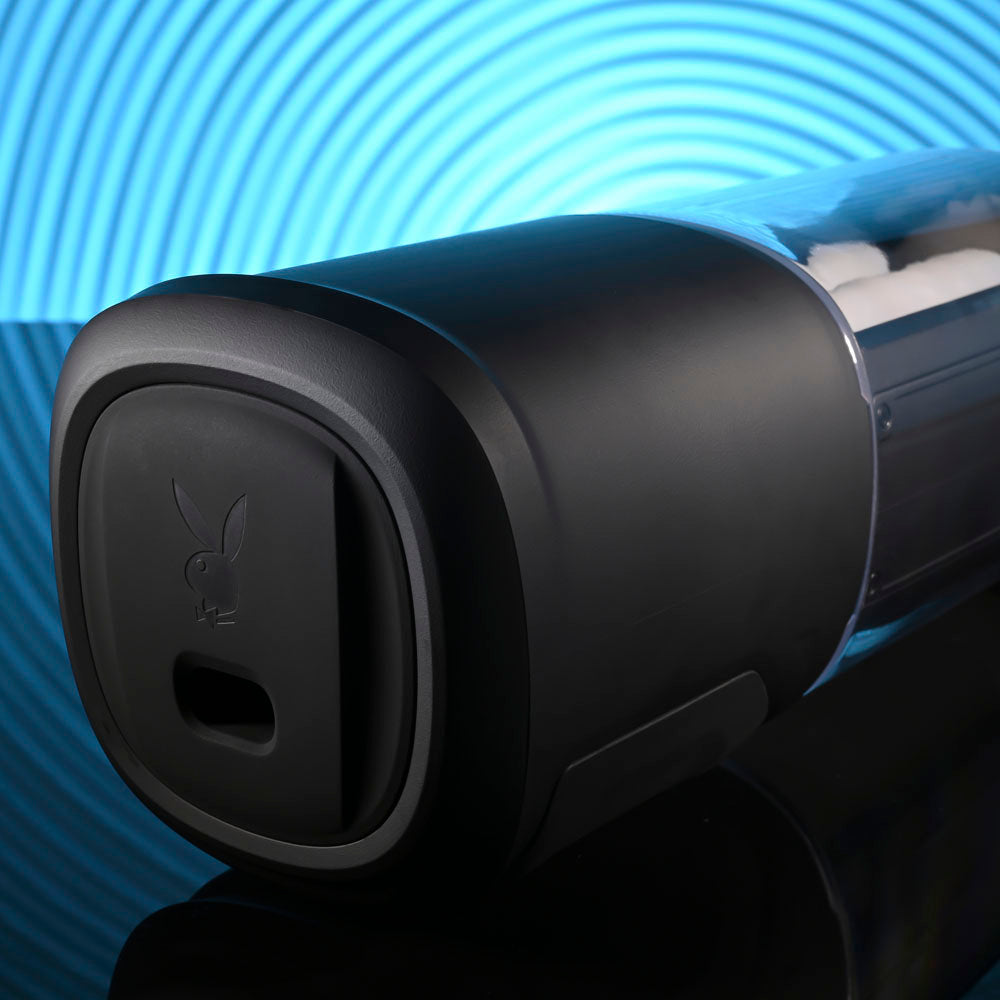 Playboy Pleasure SIDE PIECE - USB Rechargeable Warming Auto Stroker with sleek black design and soft pads.