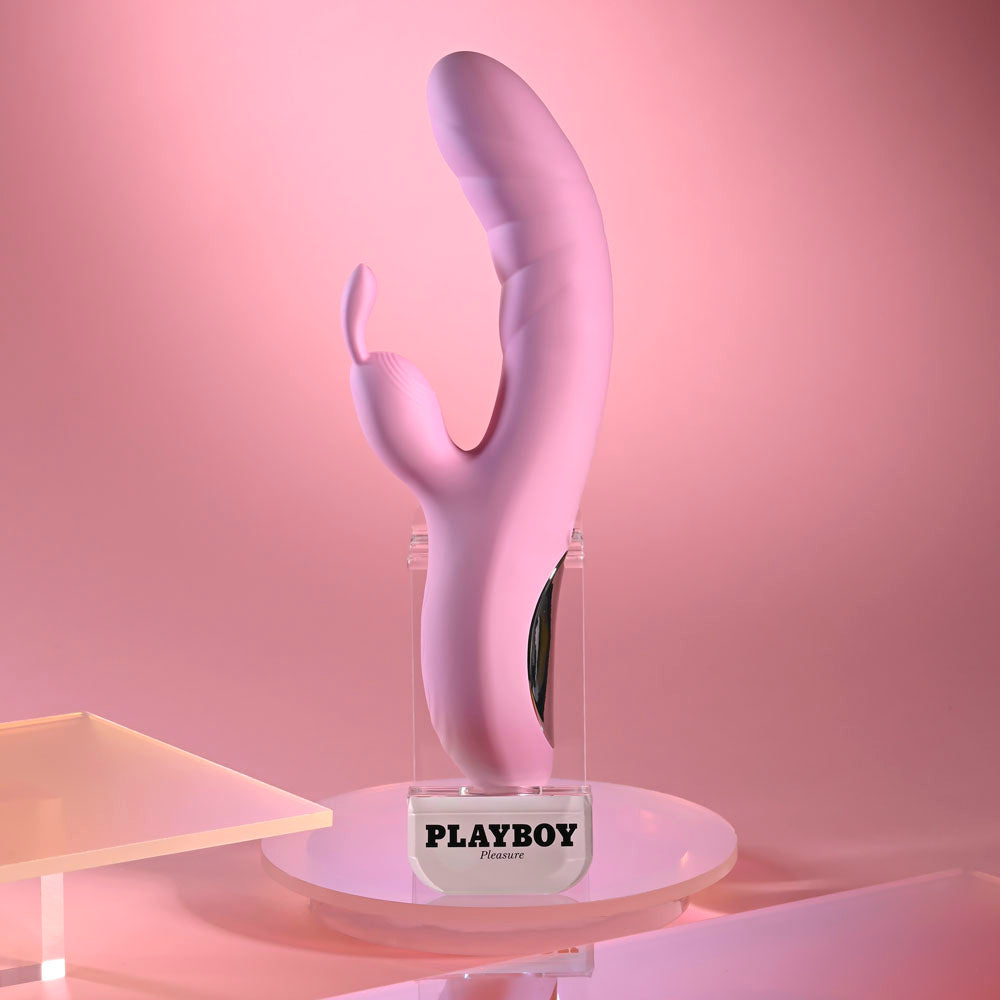 Playboy Pleasure RUB ME RIGHT - 23.2 cm USB Rechargeable Thrusting Rabbit Vibrator on display, perfect for intimate essentials for her.
