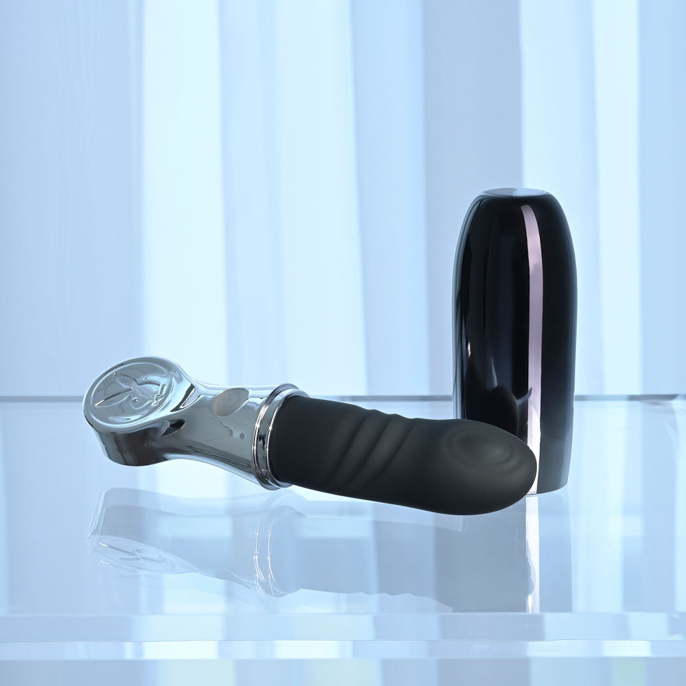 Playboy Pleasure BON VOYAGE - /Chrome 18.7 cm USB-C Rechargeable Tapping Vibrator displayed on a sleek surface.
