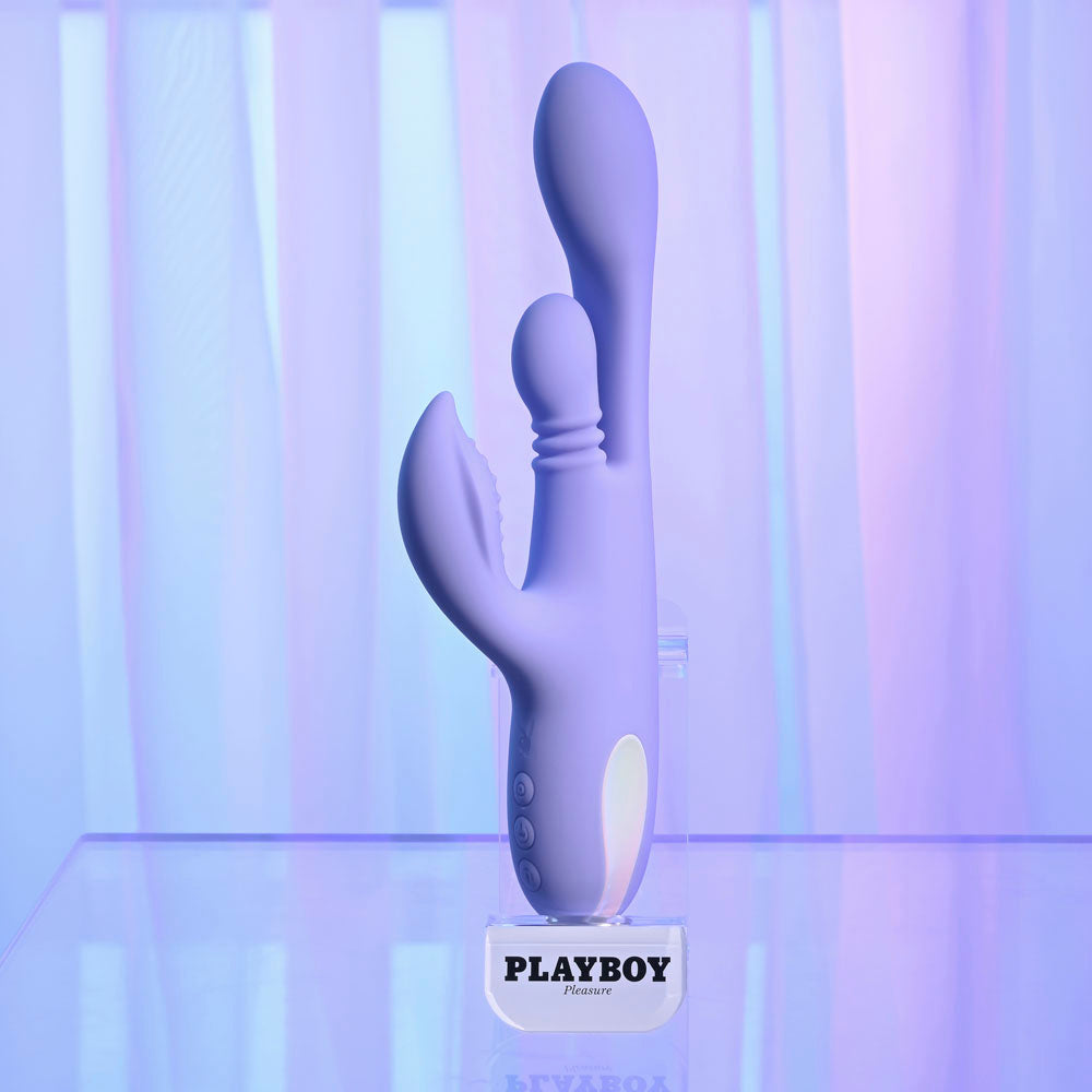 Playboy Pleasure NUBBIN RUBBIN - 24.1 cm USB Rechargeable Thrusting Rabbit Vibrator displayed elegantly.