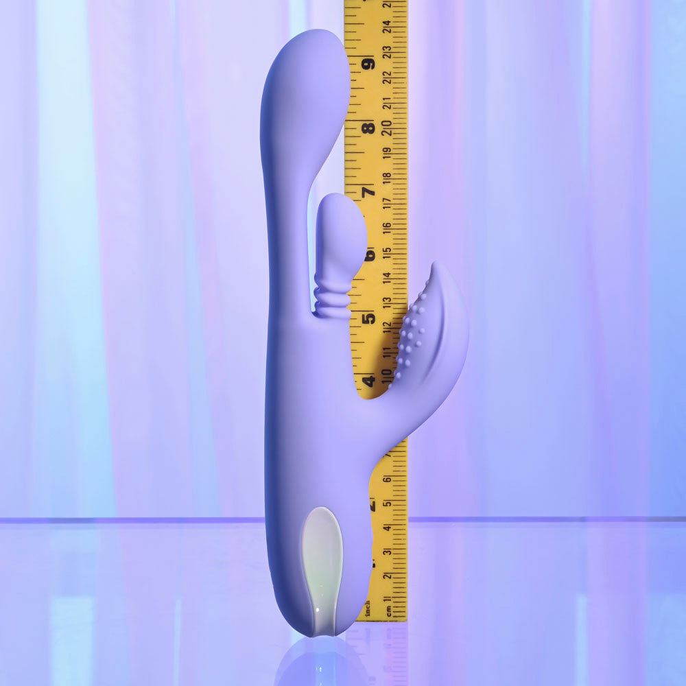 Playboy Pleasure NUBBIN RUBBIN - 24.1 cm USB Rechargeable Thrusting Rabbit Vibrator next to a ruler for size comparison.