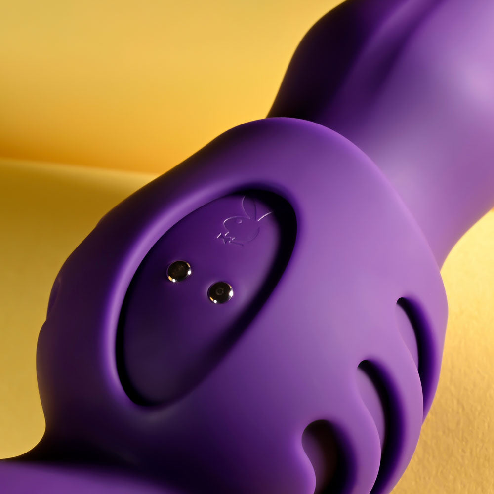 Close-up of Playboy Pleasure WIGGLE IT - 23.9 cm USB Rechargeable Wiggling Vibrator with sleek purple design.