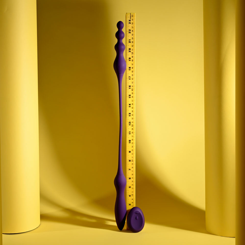 Playboy Pleasure THIS & THAT - 60 cm USB Rechargeable Flexible Dual Ended Vibrator next to a ruler for size comparison.