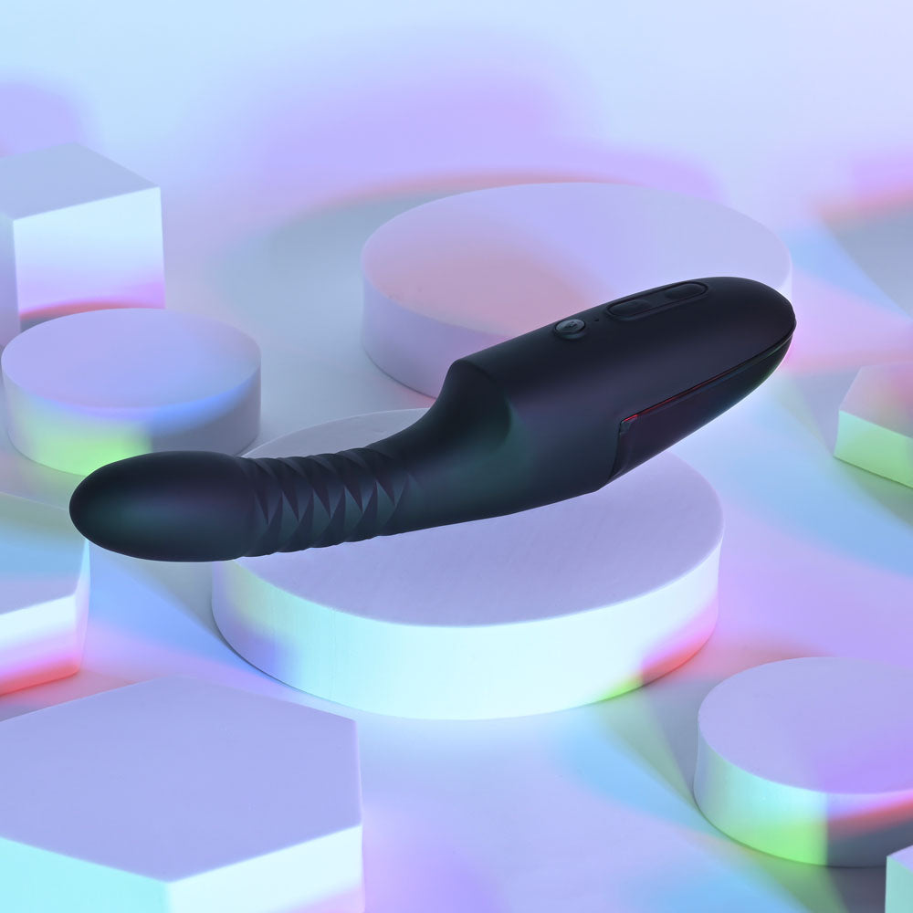 Playboy Pleasure OVERDRIVE, a sleek, USB rechargeable thrusting vibrator featuring vibrant colors.