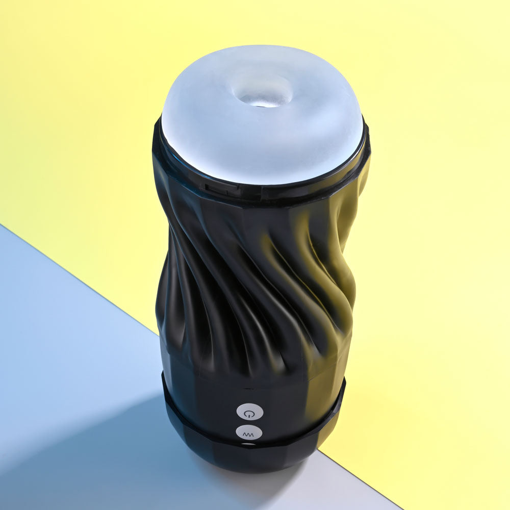 Playboy Pleasure SOLO - USB Rechargeable Vibrating and Sucking Stroker on a multicolored background.