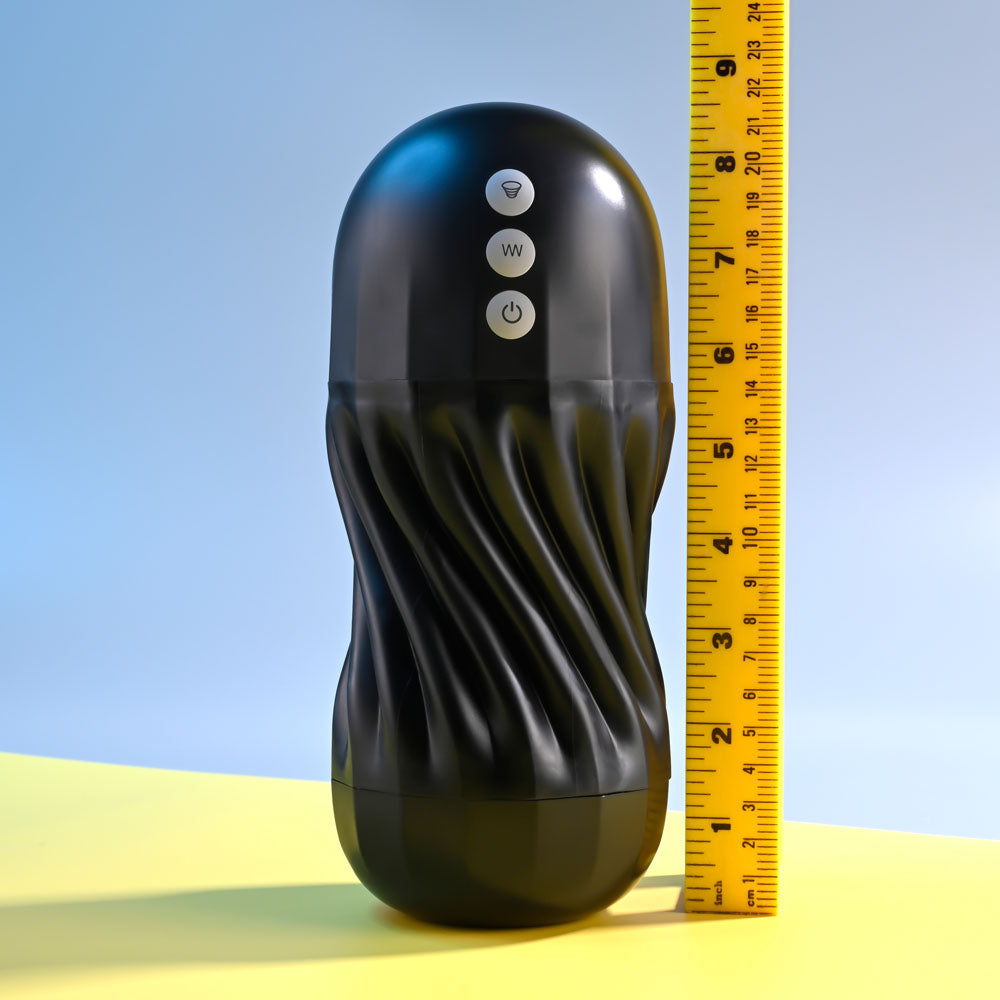 Playboy Pleasure SOLO - USB Rechargeable Vibrating and Sucking Stroker next to a ruler for size comparison.