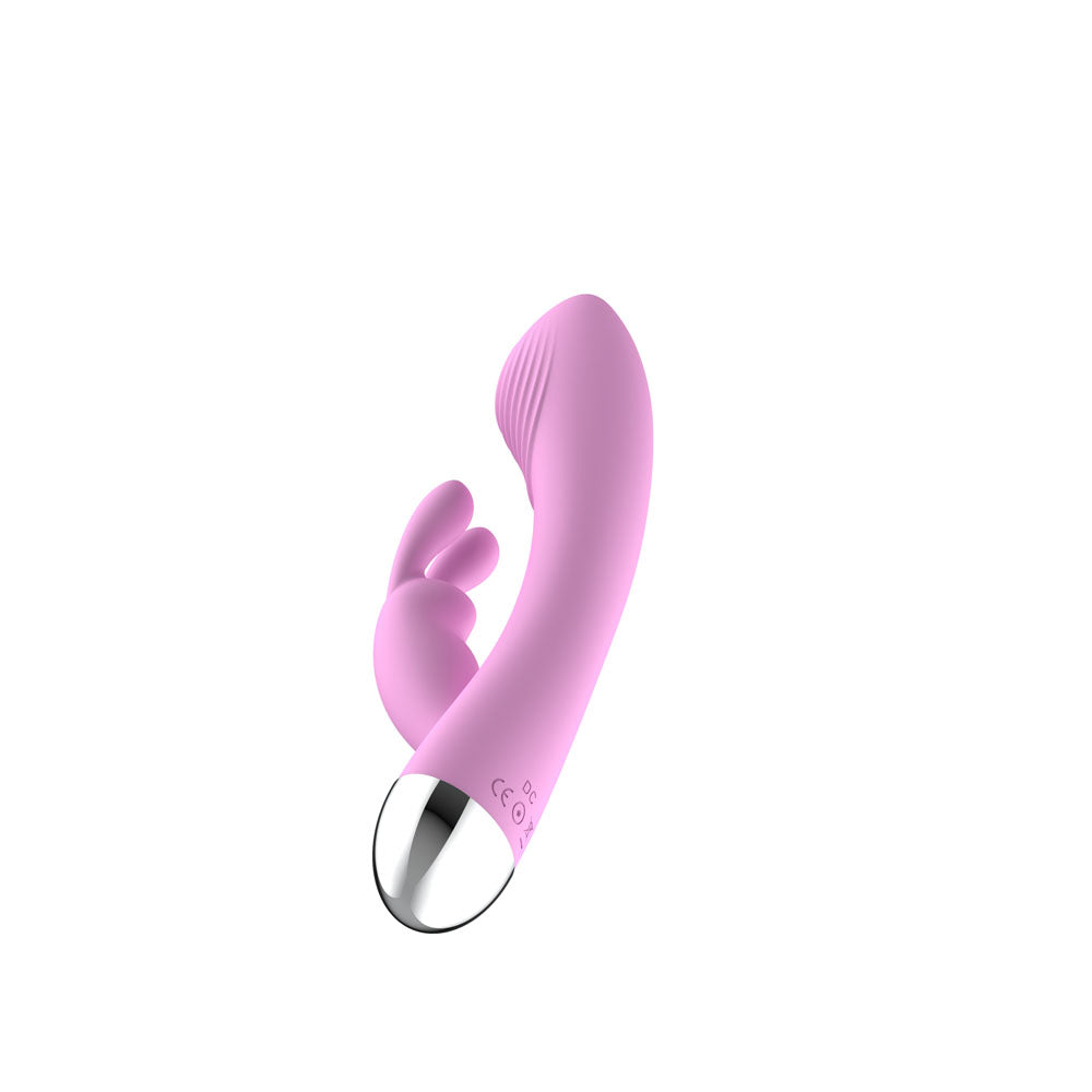 Passion Play Silicone Rabbit Vibrator in pink, featuring dual stimulation for enhanced pleasure.