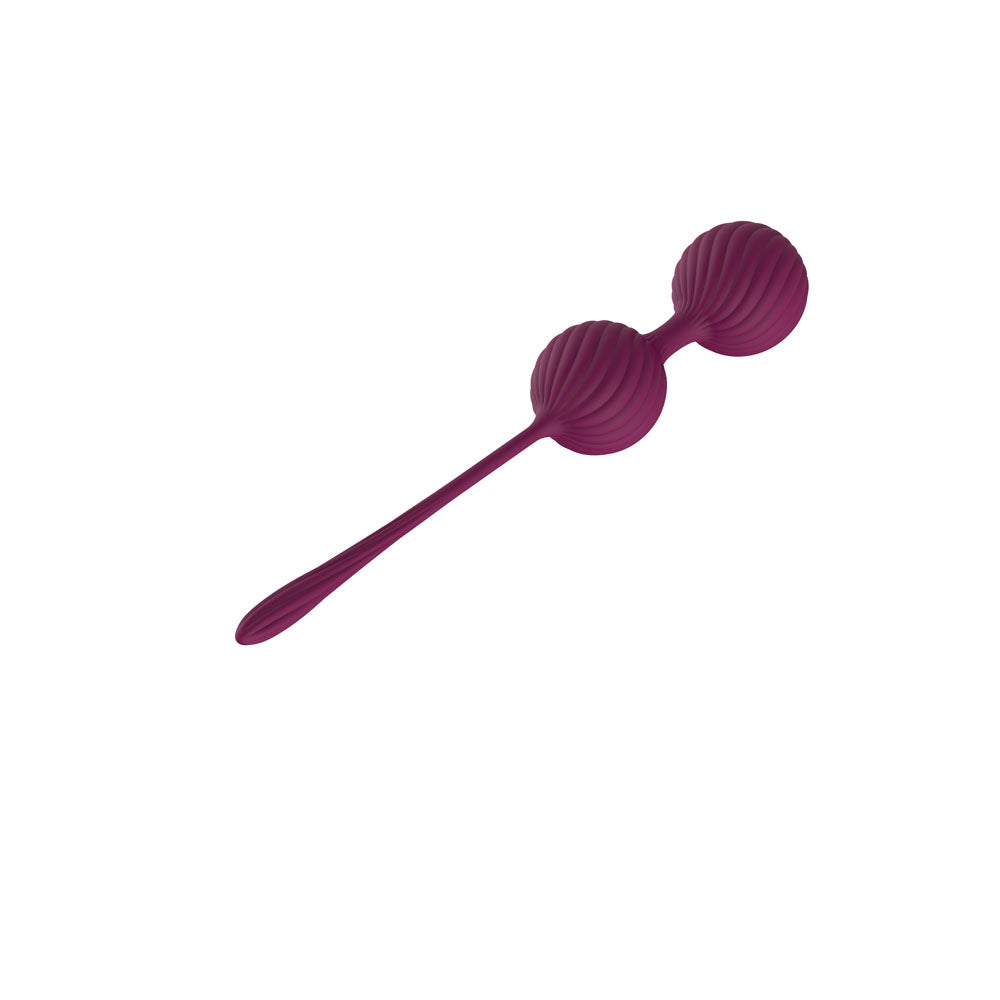 Passion Play dual kegel balls for pelvic training in rich purple silicone, designed for comfortable pelvic floor exercises.