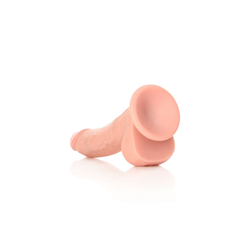 REALROCK Realistic Regular Curved Dong with Balls - 20.5 cm - 20.5 cm (8'') Dong shown on a reflective surface.