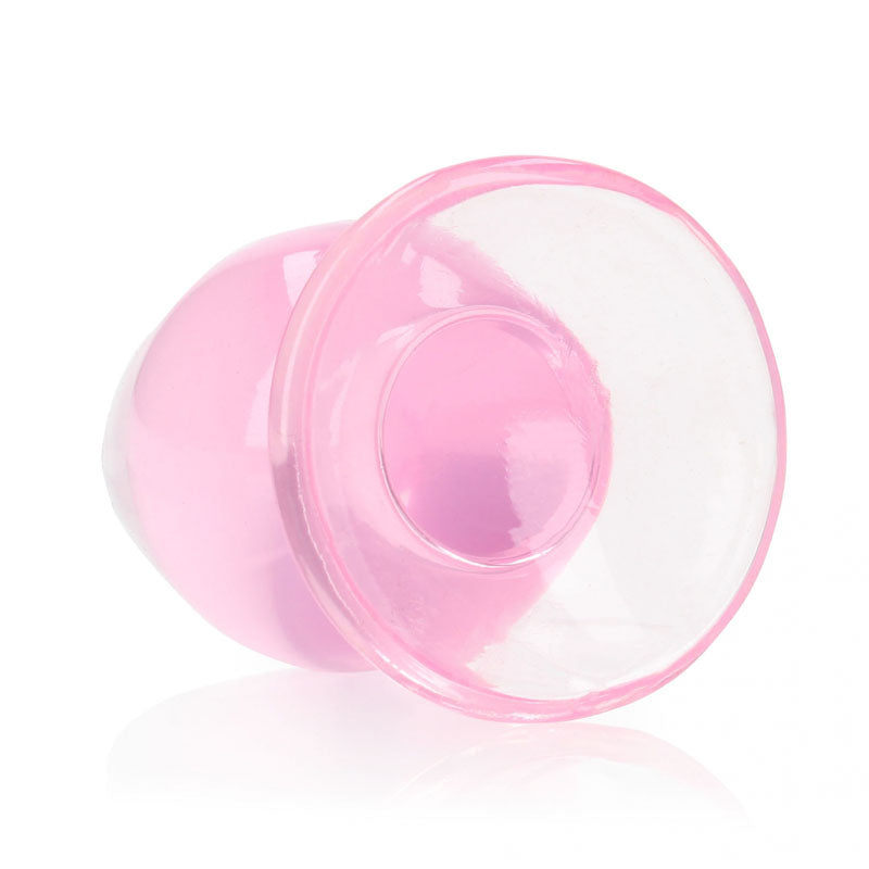 REALROCK 9 cm anal plug with a clear design and suction cup base for hands-free enjoyment.