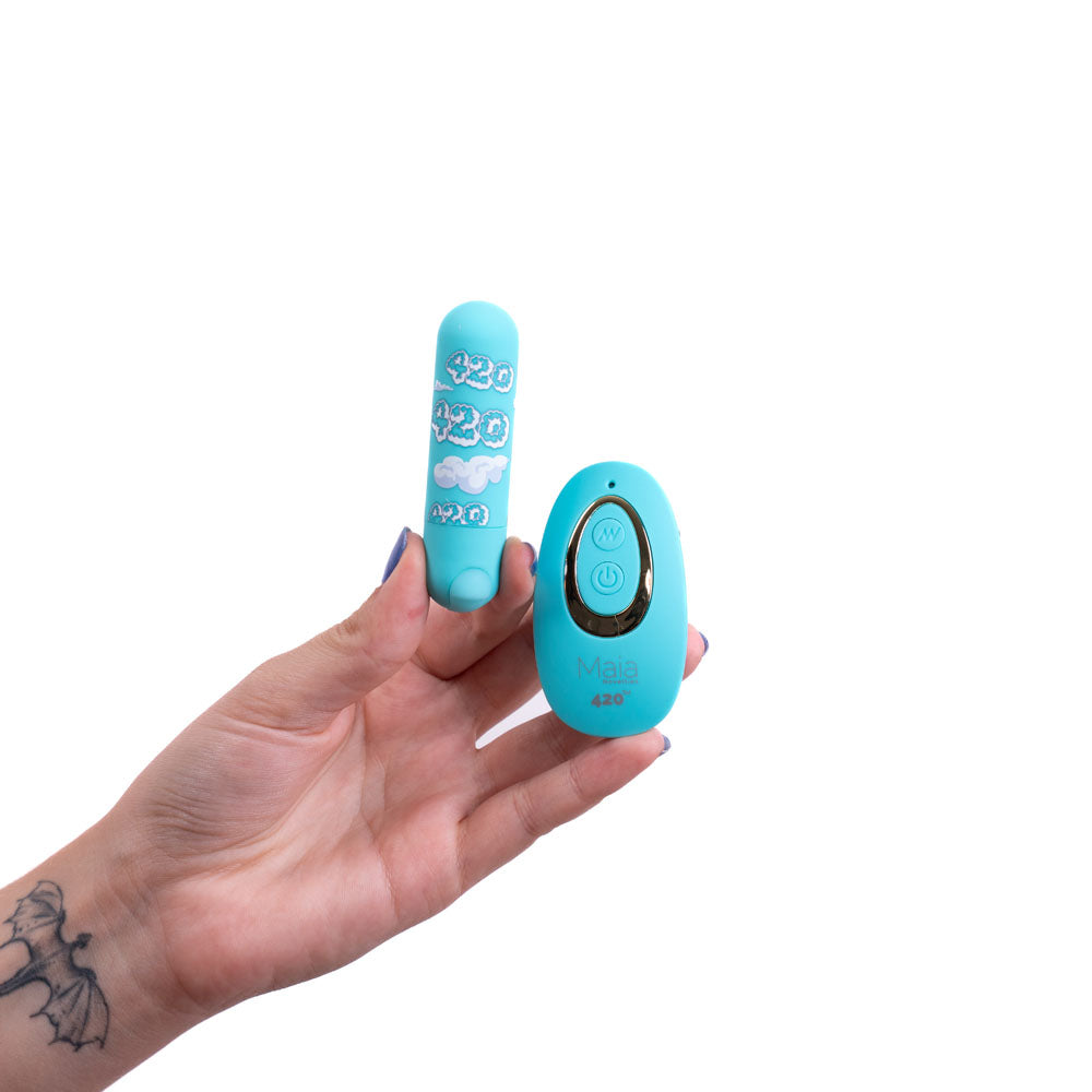 Maia JESSI 420 Remote - Sky 7.6 cm USB Rechargeable Bullet with Wireless Remote in hand.