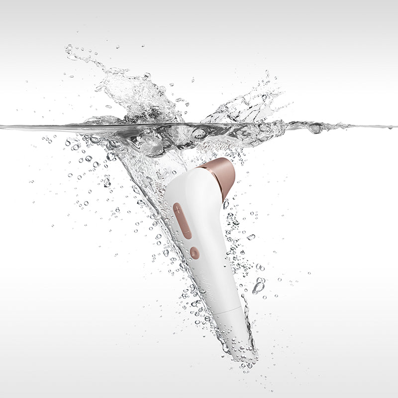 Satisfyer Number 2 -  Touch-Free Clitoral Stimulator splashing in water showcasing its waterproof design.