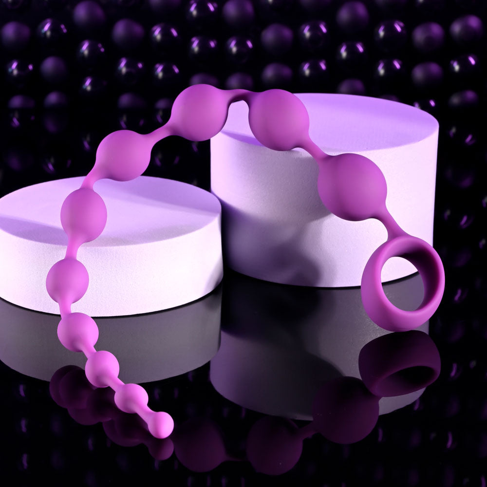 Selopa BEADED ADVENTURE -  35.5 cm Anal Beads on display with purple silicone and safe retrieval ring.