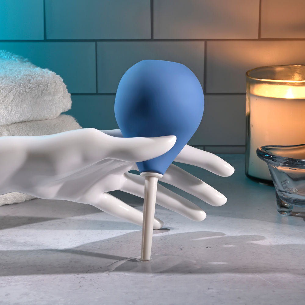Selopa SQUEAKY CLEAN -  Unisex Douche held in a gloved hand, perfect for intimate cleansing essentials.