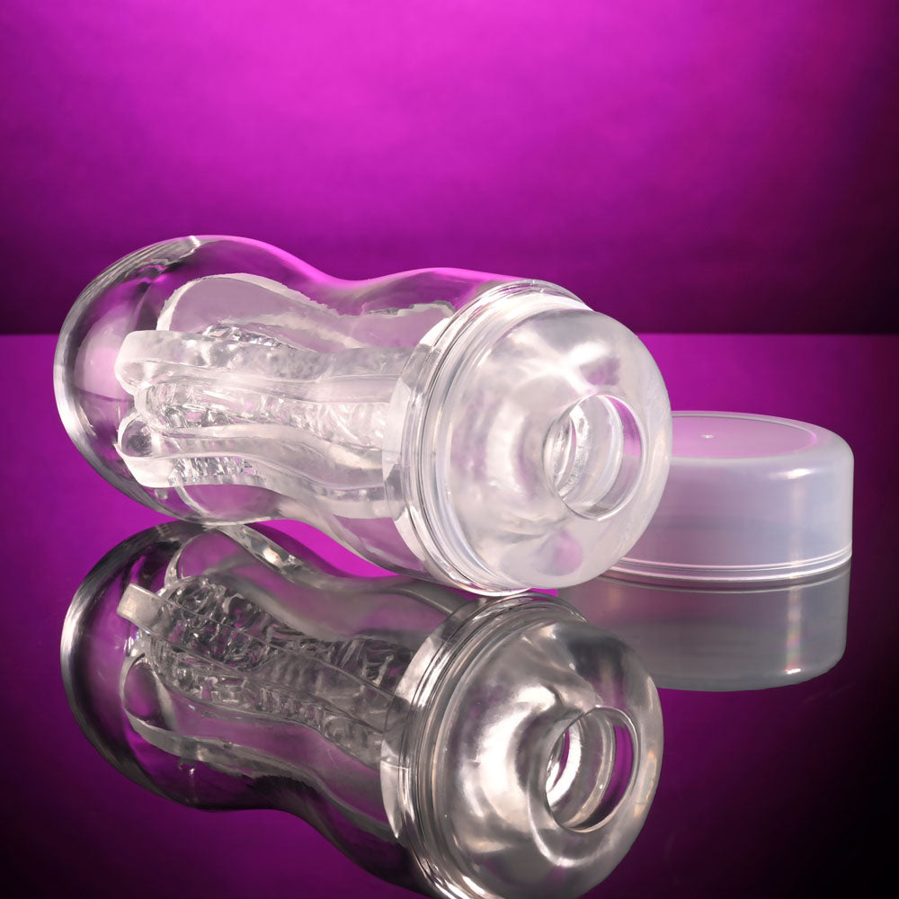 Selopa STROKE OF LUCK -  Stroker on a reflective surface, featuring soft beaded inner channel and removable cap.