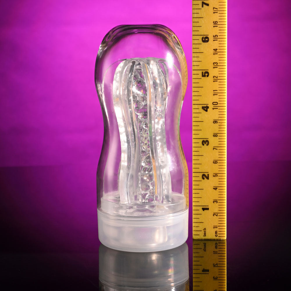 Selopa STROKE OF LUCK - Stroker showing its soft beaded inner channel with a ruler for size reference.