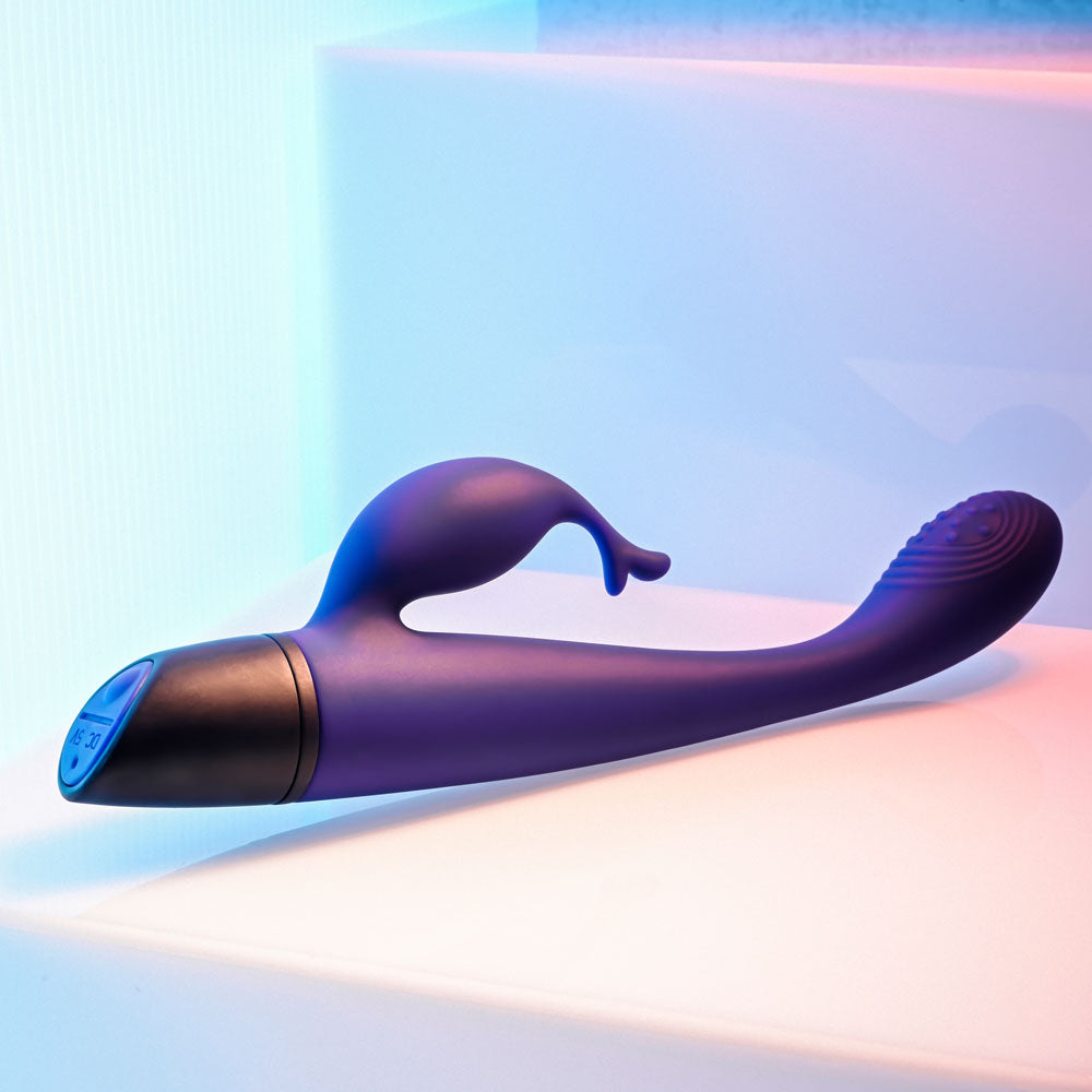 Selopa PLUM PASSION -  18.3 cm USB Rechargeable Rabbit Vibrator in purple against a colorful background.