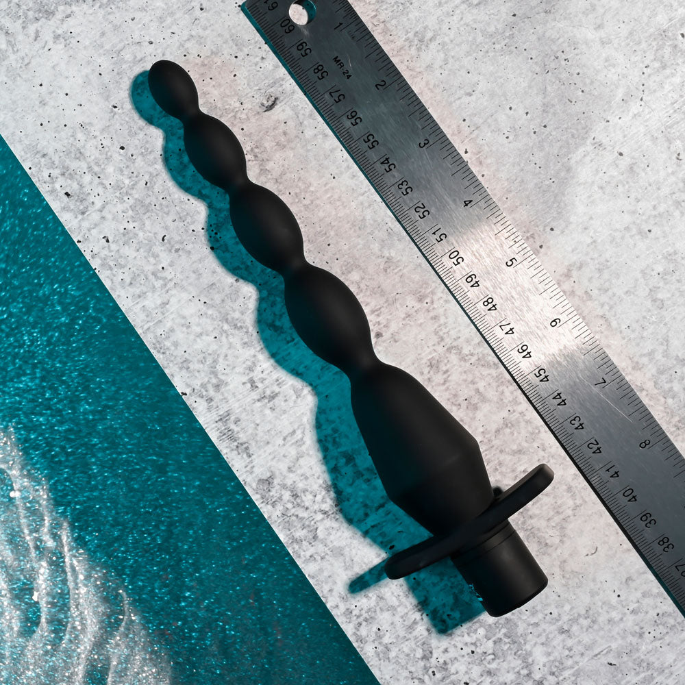 Selopa VIBRATING BUTT BEADS -  22 cm USB Rechargeable Vibrating Anal Beads shown with ruler for size reference.